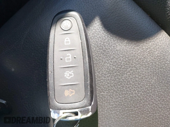 2015 Ford Escape Titanium with VIN 1FMCU9JX6FUB86304, listed as a IAAI auction lot 41595761 with 104,317 mi miles and . Bid and sale history available at DreamBid. Image 11.