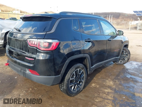 2019 Jeep Compass Trailhawk with VIN 3C4NJDDBXKT671364, listed as a IAAI auction lot 41655974 with 104,252 mi miles and . Bid and sale history available at carsss.com. Image 4.