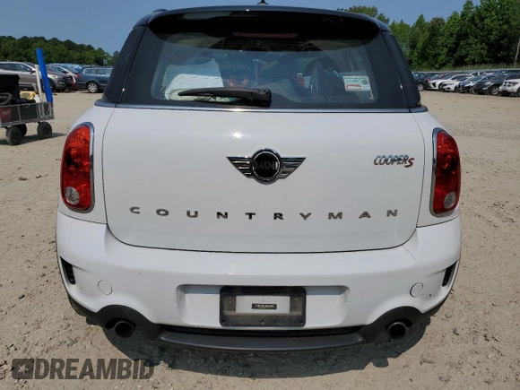 2014 MINI Countryman S with VIN WMWZC5C5XEWP37128, listed as a Copart auction lot 59549885 with 84,121 mi miles and Salvage title. Bid and sale history available at DreamBid. Image 6.