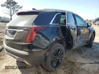 2022 Cadillac XT5 AWD Premium Luxury with VIN 1GYKNDRS7NZ164512, listed as a Copart auction lot 49236945 with 30,019 mi miles and Salvage title. Bid and sale history available at DreamBid. Image 3.