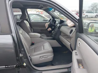 2013 Honda Pilot EX-L with VIN 5FNYF4H74DB041569, listed as a IAAI auction lot 41728937 with 223,355 mi miles and . Bid and sale history available at DreamBid. Image 5.