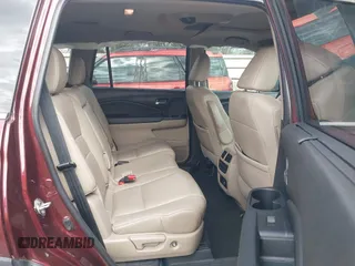 2019 Honda Pilot Touring 8-Passenger z VIN 5FNYF5H95KB009122, wystawiony jako IAAI lot #41573338 z przebiegiem 85 845 mil mil oraz . Historia ofert i sprzedaży dostępna na DreamBid. Obrazek 8.