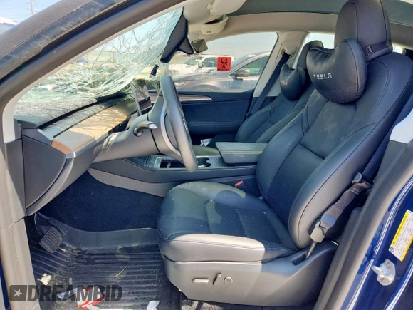 2024 Tesla Model Y Long Range z VIN 7SAYGDEE3RA238059, wystawiony jako Copart lot #61395925 z przebiegiem 14 991 mil mil oraz Szkoda całkowita • Salvage title. Historia ofert i sprzedaży dostępna na DreamBid. Obrazek 7.