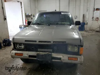1987 Nissan Hardbody E z VIN JN6ND11S3HW057122, wystawiony jako Copart lot #73303004 z przebiegiem 233 309 mil mil oraz Szkody całkowita. Historia ofert i sprzedaży dostępna na DreamBid. Obrazek 5.