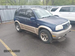 2001 Suzuki Grand Vitara JLX z VIN JS3TD62VX14165885, wystawiony jako IAAI lot #42091059 z przebiegiem 197 030 mil mil oraz . Historia ofert i sprzedaży dostępna na DreamBid. Obrazek 1.