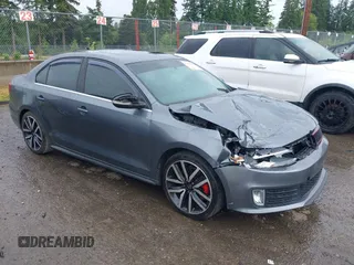 2014 Volkswagen Jetta GLI z VIN 3VW4T7AJ2EM208598, wystawiony jako IAAI lot #42381855 z przebiegiem 82 761 mil mil oraz . Historia ofert i sprzedaży dostępna na DreamBid. Obrazek 1.
