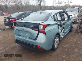 2022 Toyota Prius L Eco with VIN JTDKAMFU4N3164963, listed as a IAAI auction lot 41859931 with 5,118 mi miles. Bid and sale history available at carsss.com. Image 6.