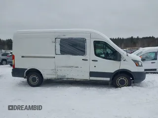 2016 Ford Transit Cargo z VIN 1FTYR2CM2GKA98918, wystawiony jako IAAI lot #41456987 z przebiegiem 51 290 mil mil oraz . Historia ofert i sprzedaży dostępna na DreamBid. Obrazek 13.