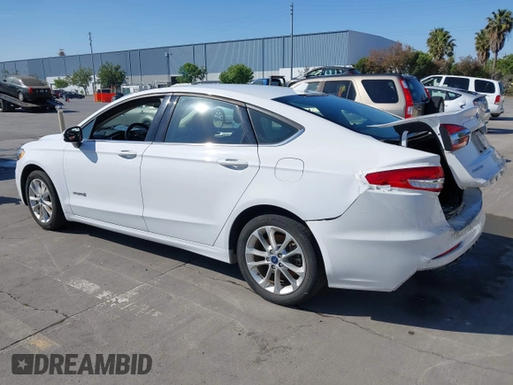 2019 Ford Fusion Hybrid SE with VIN 3FA6P0LU9KR207824, listed as a IAAI auction lot 42153330 with 69,966 mi miles. Bid and sale history available at carsss.com. Image 3.