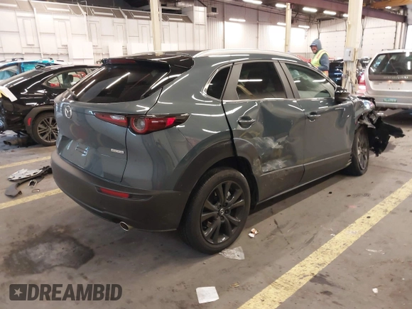 2023 Mazda CX-30 2.5 S Carbon Edition with VIN 3MVDMBCM3PM567115, listed as a IAAI auction lot 41079869 with 7,158 mi miles. Bid and sale history available at carsss.com. Image 4.