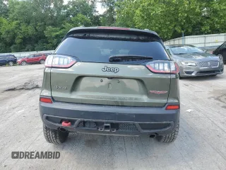 2021 Jeep Cherokee Trailhawk z VIN 1C4PJMBX0MD185078, wystawiony jako Copart lot #63264765 z przebiegiem 92 393 mil mil oraz Szkoda całkowita • Salvage title. Historia ofert i sprzedaży dostępna na DreamBid. Obrazek 6.