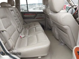 1999 Lexus LX 470 z VIN JT6HT00W8X0045705, wystawiony jako IAAI lot #42005587 z przebiegiem 443 758 mil mil oraz . Historia ofert i sprzedaży dostępna na DreamBid. Obrazek 8.