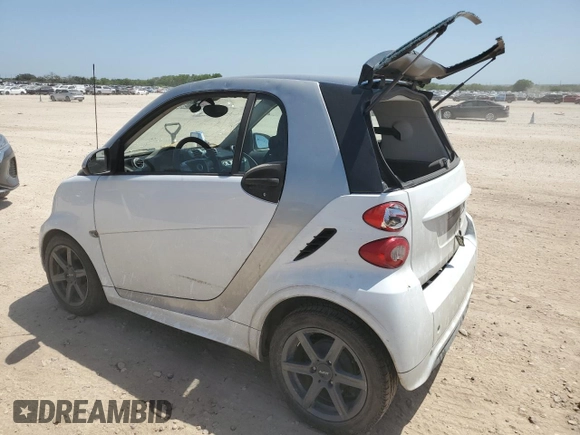 2013 Smart fortwo Pure with VIN WMEEJ3BA9DK627656, listed as a Copart auction lot 52109195 with 118,181 mi miles and Clean title. Bid and sale history available at DreamBid. Image 2.