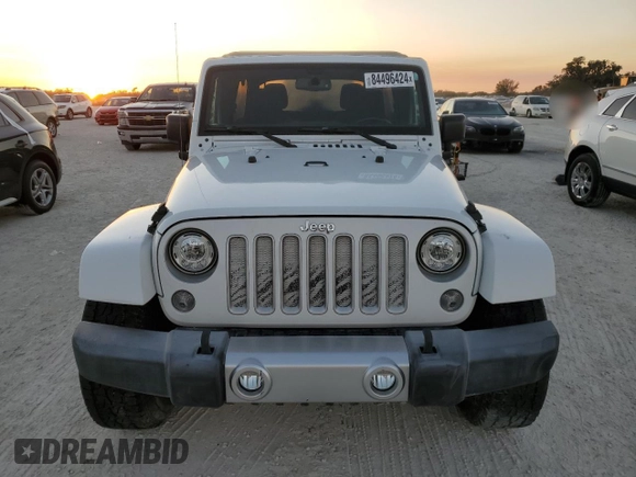 2017 Jeep Wrangler Unlimited Sahara with VIN 1C4BJWEG4HL701813, listed as a Copart auction lot 84496424 with 49,858 mi miles and Salvage title. Bid and sale history available at DreamBid. Image 5.