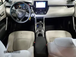 2023 Toyota Corolla Cross L with VIN 7MUAAABG8PV049431, listed as a Copart auction lot 56982055 with 20,275 mi miles and Salvage title. Bid and sale history available at DreamBid. Image 8.