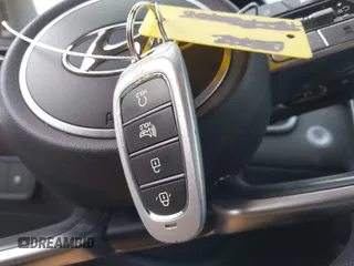 2022 Hyundai Tucson SEL z VIN 5NMJBCAE3NH070531, wystawiony jako IAAI lot #41222494 z przebiegiem 91 358 mil mil oraz . Historia ofert i sprzedaży dostępna na DreamBid. Obrazek 11.