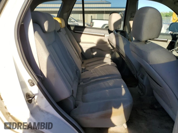 2007 Hyundai Santa Fe GLS z VIN 5NMSG13DX7H065375, wystawiony jako Copart lot #68337973 z przebiegiem 197 147 mil mil oraz Szkoda całkowita • Salvage title. Historia ofert i sprzedaży dostępna na DreamBid. Obrazek 10.