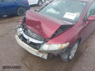 2010 Honda Civic Sdn LX with VIN 19XFA1F59AE062683, listed as a IAAI auction lot 41841984 with 154,936 mi miles. Bid and sale history available at carsss.com. Image 6.