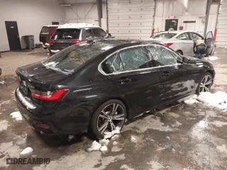 2021 BMW 3 Series 330i xDrive with VIN 3MW5R7J02M8C21465, listed as a IAAI auction lot 38490636 with 37,391 mi miles. Bid and sale history available at carsss.com. Image 4.