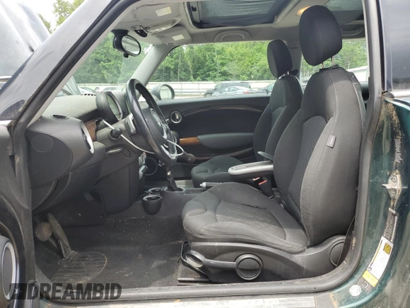 2007 MINI Hardtop with VIN WMWMF33537TL77985, listed as a Copart auction lot 61908635 with 180,470 mi miles and Salvage title. Bid and sale history available at DreamBid. Image 7.