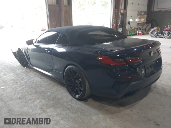 2023 BMW 8 Series with VIN WBAFY4C07PCM50546, listed as a IAAI auction lot 42403241 with 15,697 mi miles and . Bid and sale history available at DreamBid. Image 3.