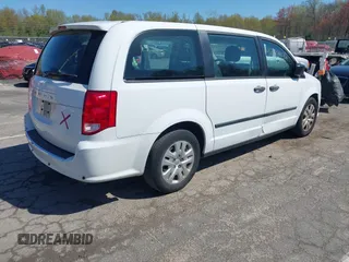 2016 Dodge Grand Caravan SE with VIN 2C4RDGBG9GR401187, listed as a IAAI auction lot 42133432 with 107,742 mi miles and . Bid and sale history available at DreamBid. Image 4.