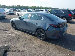 2024 Mazda 3 S Carbon Edition with VIN 3MZBPBCM6RM411828, listed as a IAAI auction lot 42802141 with 40,061 mi miles and . Bid and sale history available at DreamBid. Image 3.