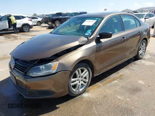 2014 Volkswagen Jetta S with VIN 3VW2K7AJ8EM319182, listed as a IAAI auction lot 42180101 with 133,495 mi miles and . Bid and sale history available at DreamBid. Image 19.