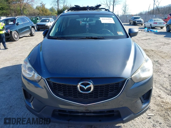 2013 Mazda CX-5 Sport z VIN JM3KE4BE3D0141748, wystawiony jako IAAI lot #41836498 z przebiegiem 163 118 mil mil oraz . Historia ofert i sprzedaży dostępna na DreamBid. Obrazek 12.