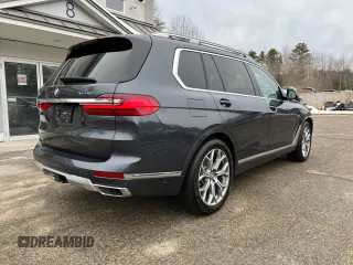 2020 BMW X7 xDrive40i with VIN 5UXCW2C0XL9C27572, listed as a Copart auction lot 47099815 with 99,426 mi miles and Clean Title. Bid and sale history available at carsss.com. Image 4.