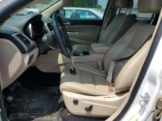 2016 Jeep Grand Cherokee Limited 75th Anniversary with VIN 1C4RJEBG0GC358588, listed as a Copart auction lot 57585695 with 221,460 mi miles and Salvage title. Bid and sale history available at DreamBid. Image 7.