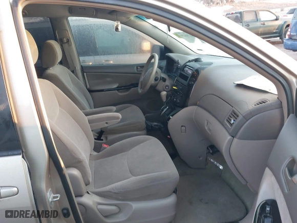 2004 Toyota Sienna CE with VIN 5TDZA23C54S069260, listed as a IAAI auction lot 41744298 with 174,769 mi miles. Bid and sale history available at carsss.com. Image 5.