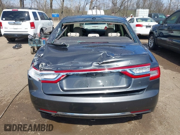 2017 Lincoln Continental Reserve z VIN 1LN6L9RP0H5636532, wystawiony jako IAAI lot #41882280 z przebiegiem 98 733 mil mil oraz . Historia ofert i sprzedaży dostępna na DreamBid. Obrazek 16.