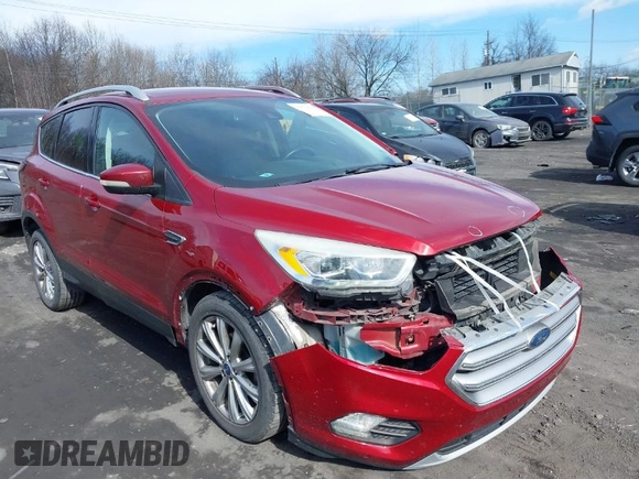 2017 Ford Escape Titanium with VIN 1FMCU0JD9HUC71738, listed as a IAAI auction lot 41673228 with 173,615 mi miles. Bid and sale history available at carsss.com. Image 1.