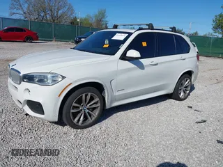 2015 BMW X5 xDrive50i with VIN 5UXKR6C5XF0J76697, listed as a IAAI auction lot 41953074 with 141,377 mi miles and . Bid and sale history available at DreamBid. Image 16.