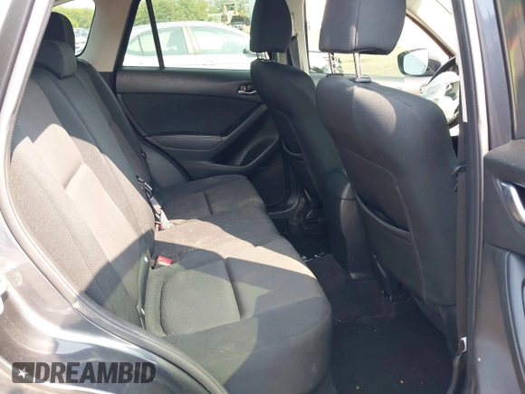 2016 Mazda CX-5 Sport with VIN JM3KE4BY7G0893984, listed as a IAAI auction lot 42479813 with Not provided miles and . Bid and sale history available at DreamBid. Image 8.