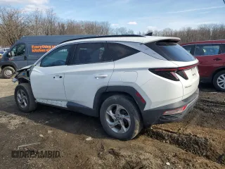 2022 Hyundai Tucson SEL with VIN 5NMJBCAE0NH027913, listed as a Copart auction lot 47072315 with 56,881 mi miles and Salvage Title. Bid and sale history available at carsss.com. Image 2.