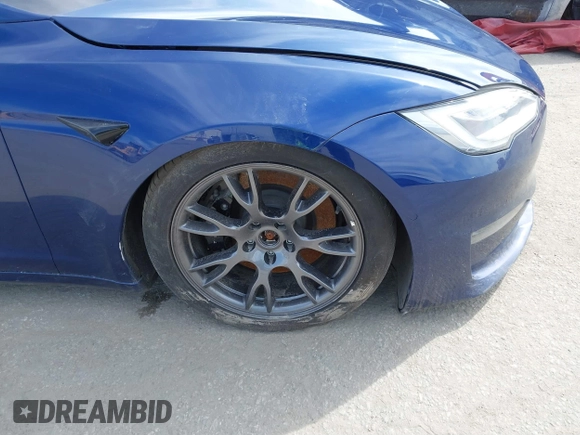 2021 Tesla Model S Long Range with VIN 5YJSA1E51MF442874, listed as a IAAI auction lot 39406495 with 36,127 mi miles and . Bid and sale history available at DreamBid. Image 23.
