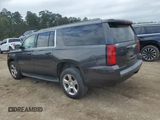 2016 Chevrolet Suburban LT with VIN 1GNSCHKCXGR464772, listed as a Copart auction lot 80065134 with 79,706 mi miles and Salvage Title. Bid and sale history available at carsss.com. Image 2.