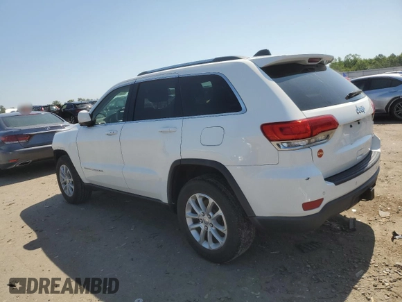 2016 Jeep Grand Cherokee Laredo with VIN 1C4RJEAG4GC500524, listed as a Copart auction lot 61613725 with 122,467 mi miles and Salvage title. Bid and sale history available at DreamBid. Image 2.