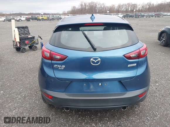 2018 Mazda CX-3 Touring with VIN JM1DKFC78J0322460, listed as a IAAI auction lot 41730662 with 58,841 mi miles. Bid and sale history available at carsss.com. Image 17.