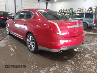 2009 Lincoln MKS with VIN 1LNHM94R59G610559, listed as a IAAI auction lot 41704552 with 168,556 mi miles. Bid and sale history available at carsss.com. Image 3.