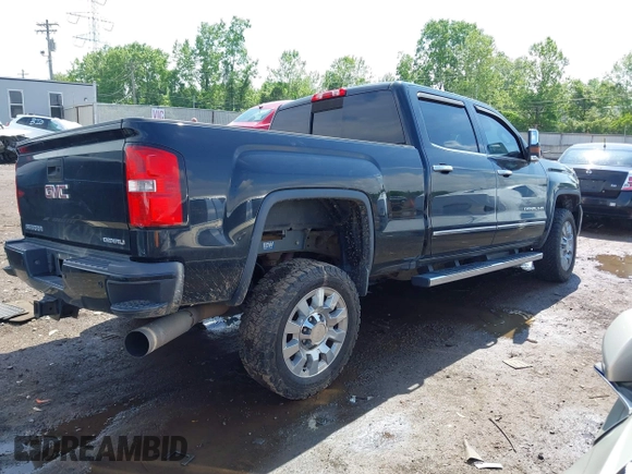 2016 GMC Sierra 2500HD Denali z VIN 1GT12UE84GF259750, wystawiony jako IAAI lot #42221632 z przebiegiem 201 055 mil mil oraz . Historia ofert i sprzedaży dostępna na DreamBid. Obrazek 4.
