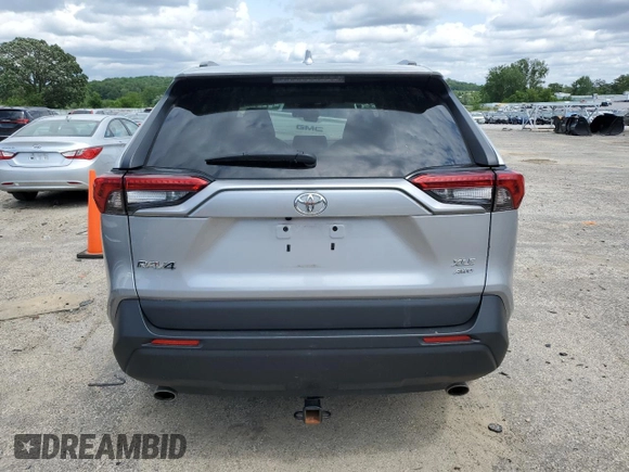 2021 Toyota RAV4 XLE Premium с VIN 2T3A1RFV3MC187245, выставлен на аукционе Copart как лот 60106205 с пробегом 104 373 миль миль и Списание • Salvage title. История ставок и продаж доступна на DreamBid. Изображение 6.