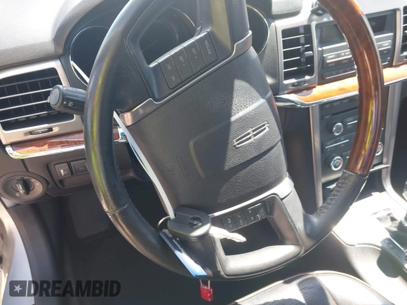 2012 Lincoln MKZ with VIN 3LNHL2GC0CR801954, listed as a IAAI auction lot 42214083 with 107,510 mi miles and . Bid and sale history available at DreamBid. Image 11.