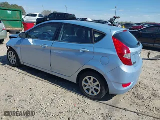 2014 Hyundai Accent GS with VIN KMHCT5AE1EU187112, listed as a IAAI auction lot 41894869 with 100,640 mi miles. Bid and sale history available at carsss.com. Image 3.
