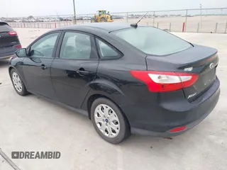 2012 Ford Focus SE with VIN 1FAHP3F21CL372769, listed as a IAAI auction lot 42107424 with 202,142 mi miles. Bid and sale history available at carsss.com. Image 3.