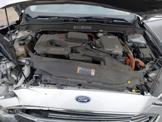 2017 Ford Fusion Energi SE with VIN 3FA6P0PU9HR354096, listed as a IAAI auction lot 42064703 with 69,601 mi miles. Bid and sale history available at carsss.com. Image 10.