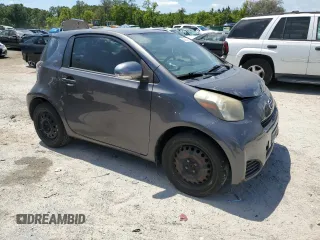 2012 Scion iQ with VIN JTNJJXB06CJ011117, listed as a Copart auction lot 52694345 with 94,547 mi miles and Salvage Title. Bid and sale history available at carsss.com. Image 4.