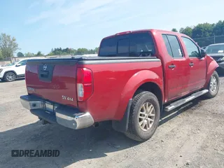 2015 Nissan Frontier Pro-4X with VIN 1N6AD0EV2FN721636, listed as a IAAI auction lot 40310184 with 132,897 mi miles and . Bid and sale history available at DreamBid. Image 4.